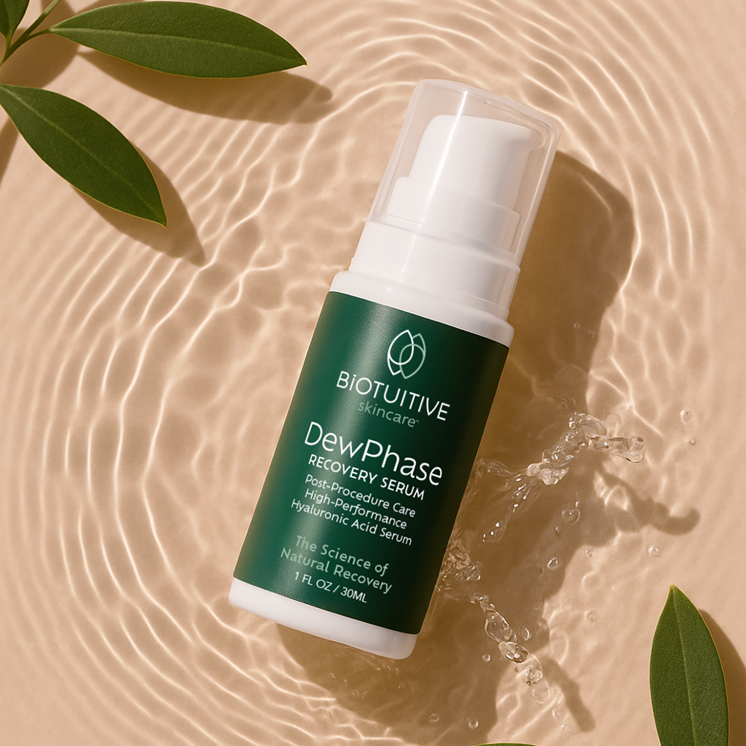 Biotuitive DewPhase Recovery Serum bottle on a textured beige surface with green leaves.